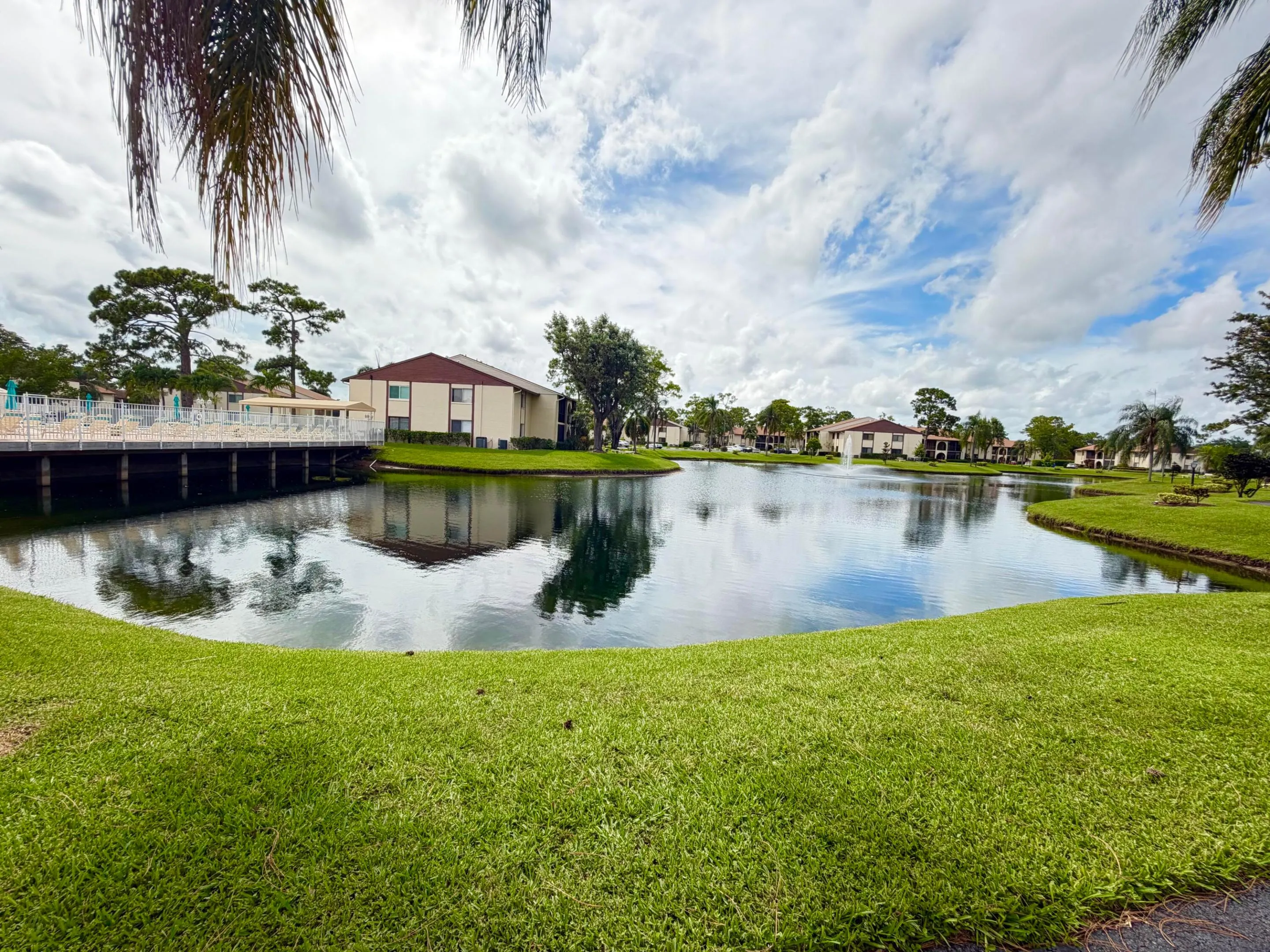 Sparkling lake with walking trail