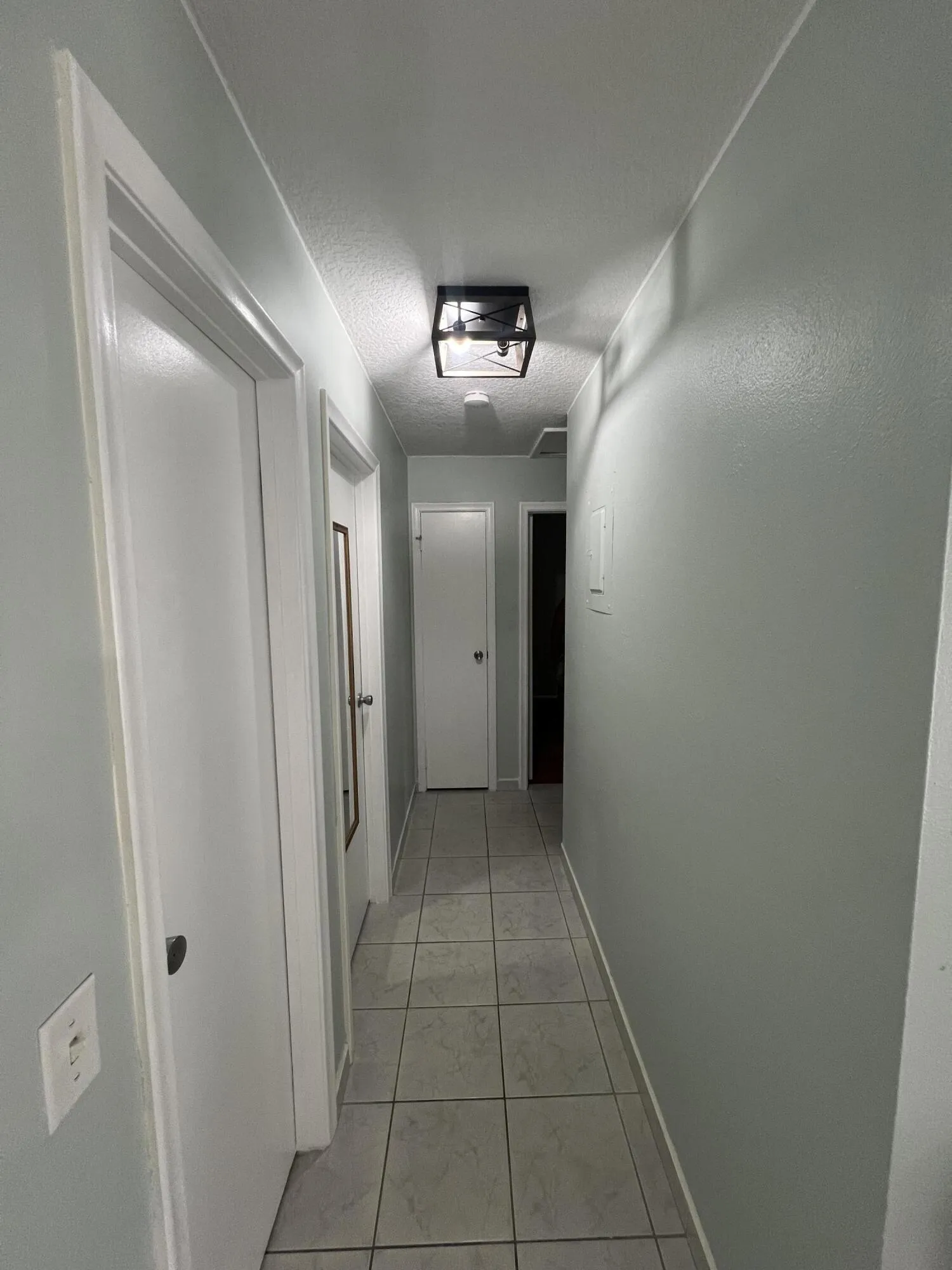 Hallway to bedrooms and guest bath