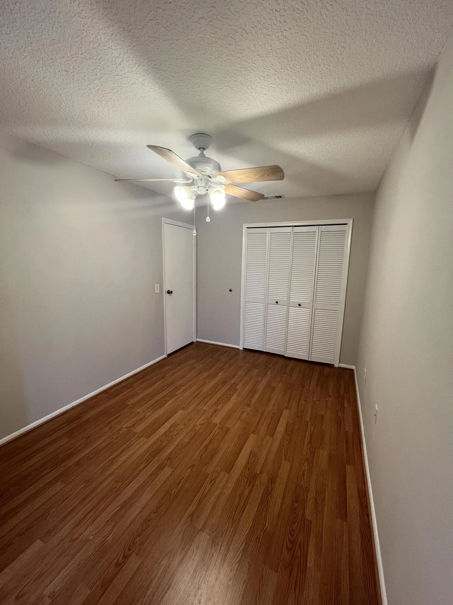 Bedroom 3 with laminate flooring