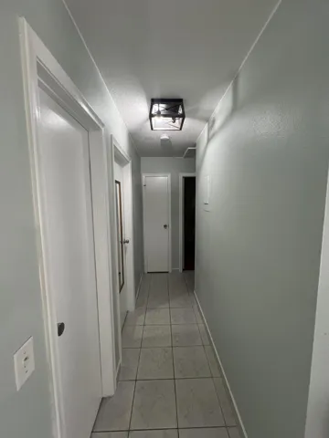Hallway to bedrooms and guest bath