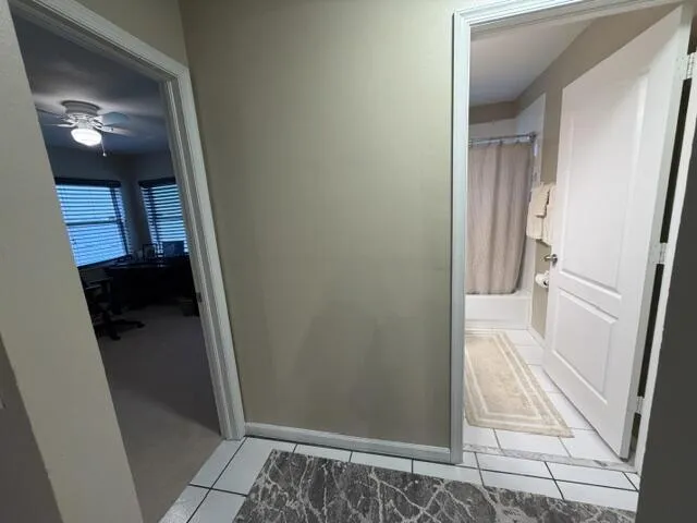 hallway by 2nd bath and 2nd & 3rd bedroom