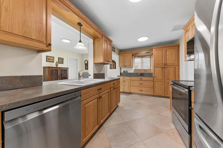 Kitchen cabinetry all replaced and stainless steel appliances.