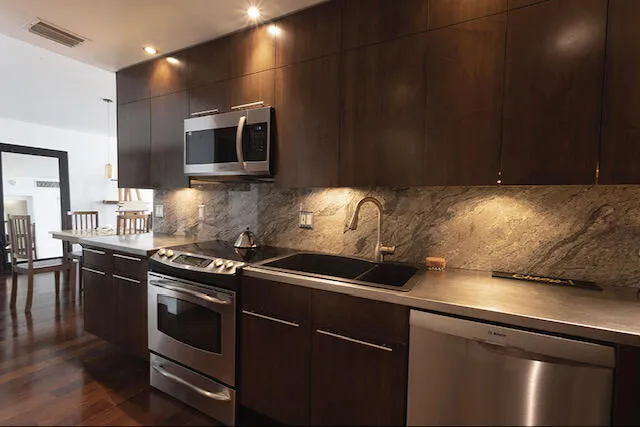 GE Profile range/oven, new Samsung microwave, new Bosch dishwasher