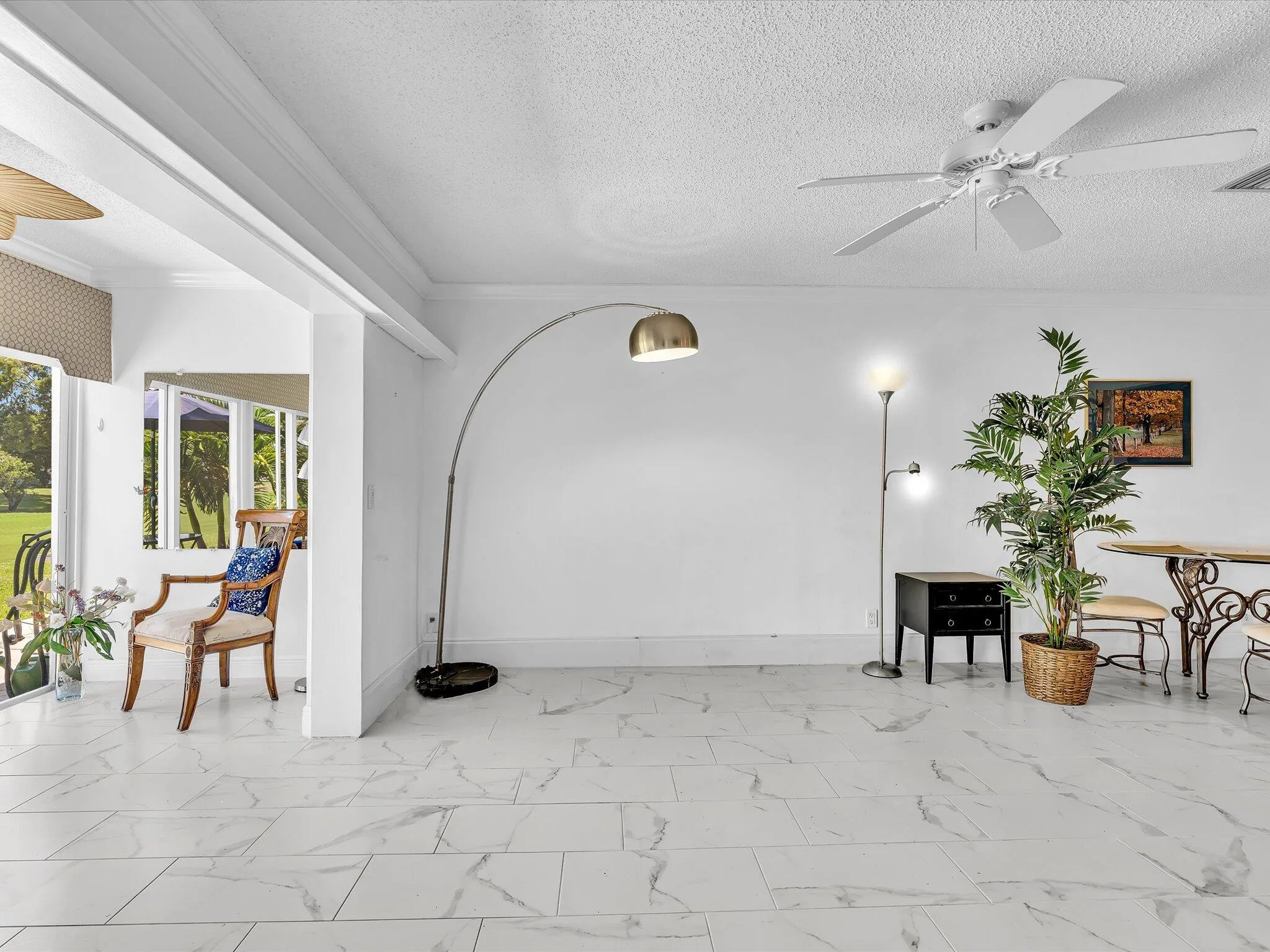 Living opens to enclosed patio