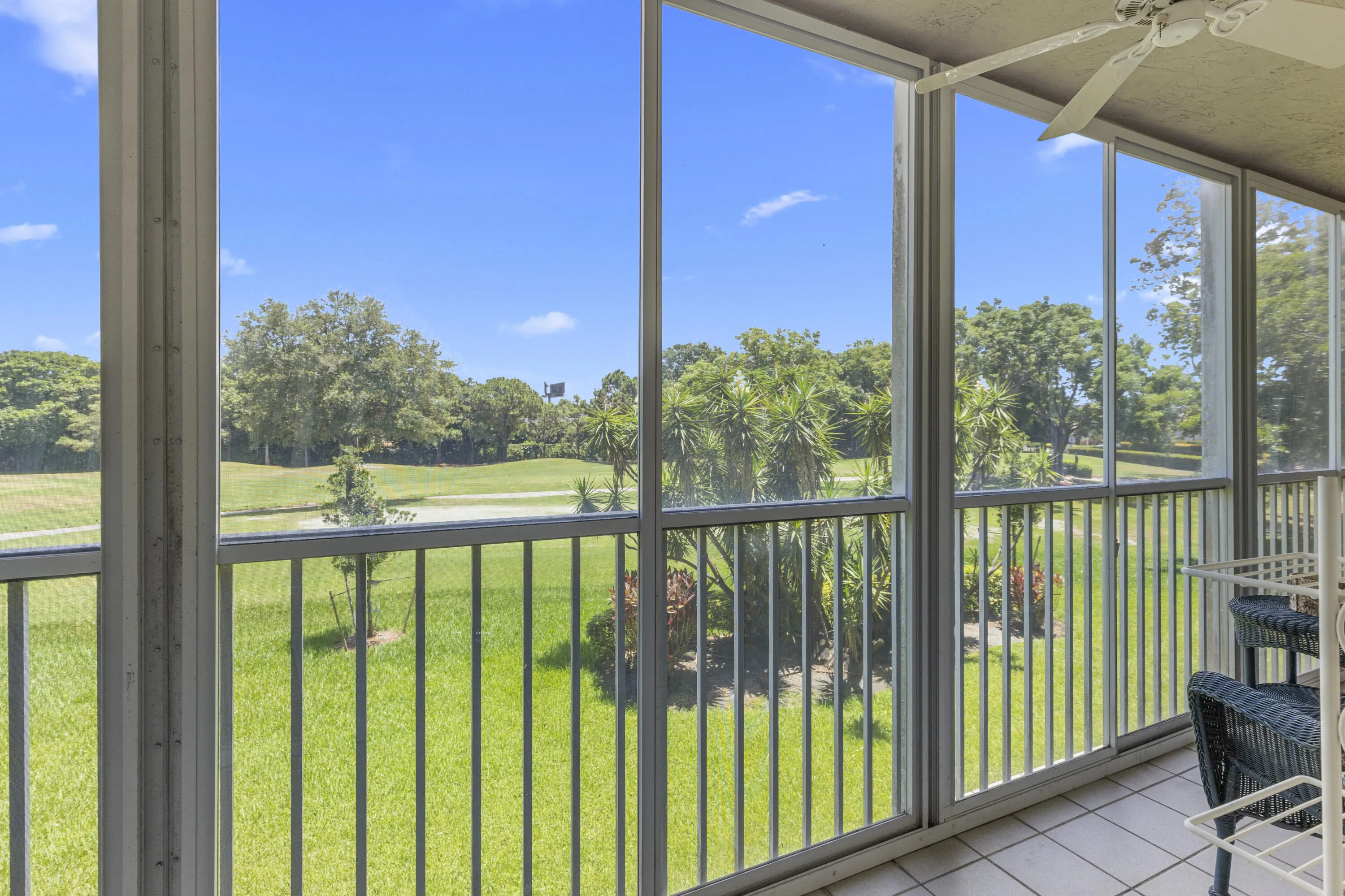 Peaceful living! covered screened patio overlooking the beautiful private 18 hole golf course