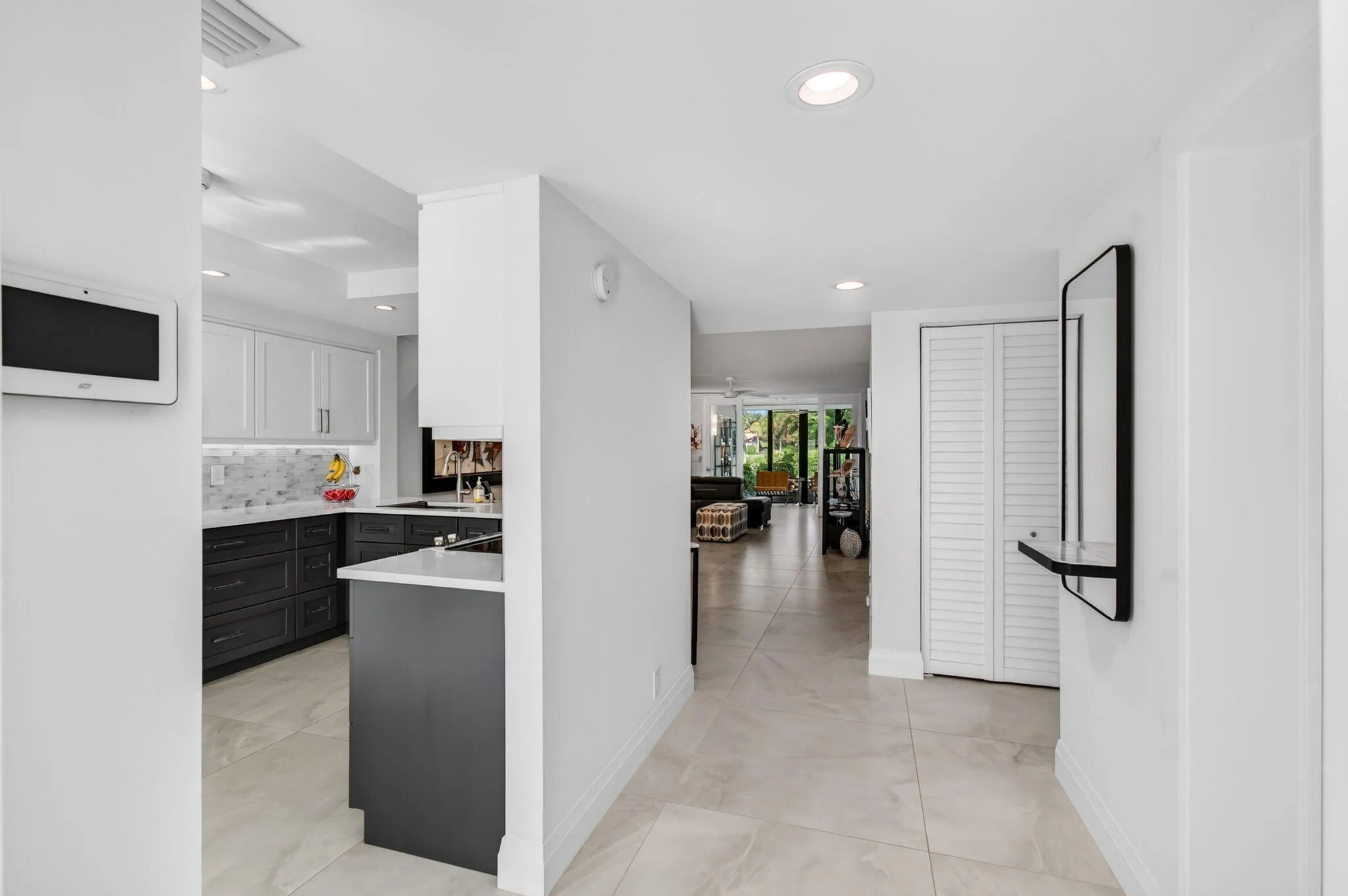 to kitchen & formal living area