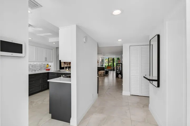 to kitchen & formal living area