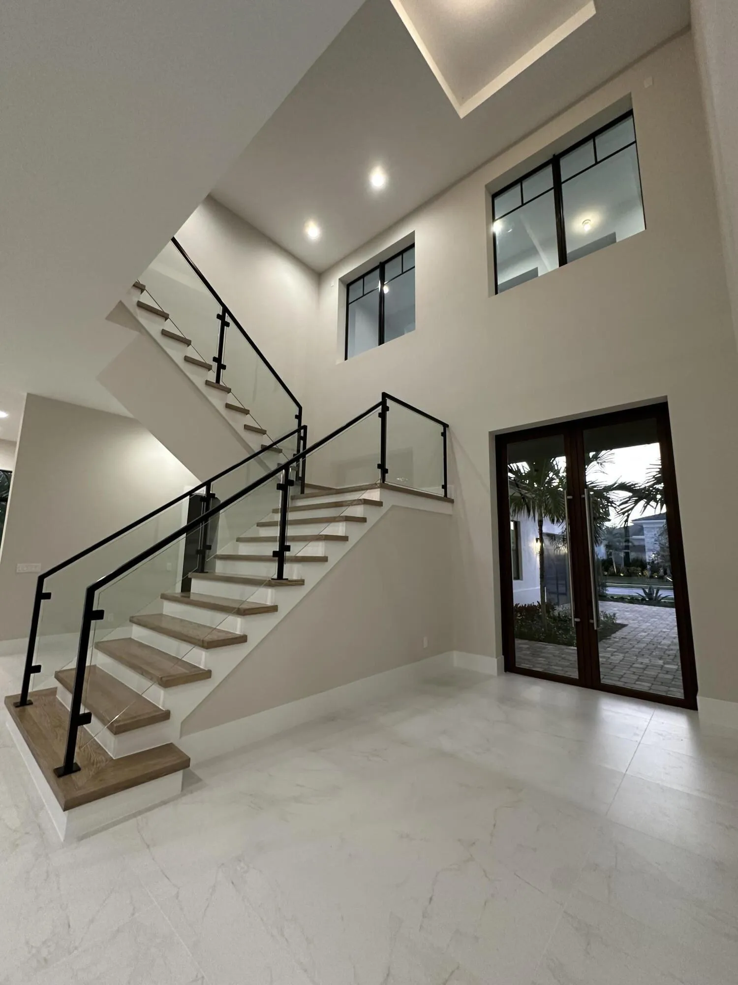 Dramatic 2-story Foyer entry with 10' Glass doors! {NOTE: Lot 89 Photo for Reference Only}