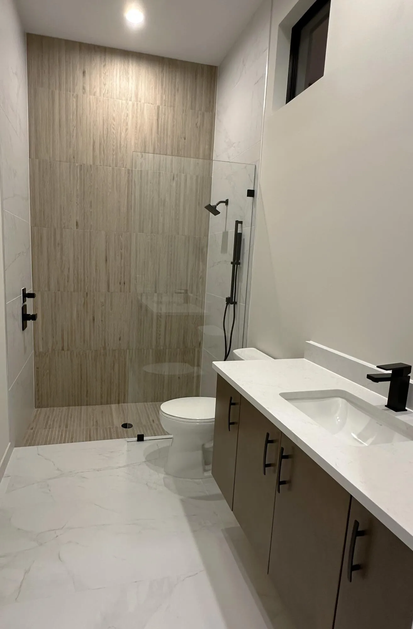 Cabana Bath with Beautiful decorative Feature Wall inside shower floor