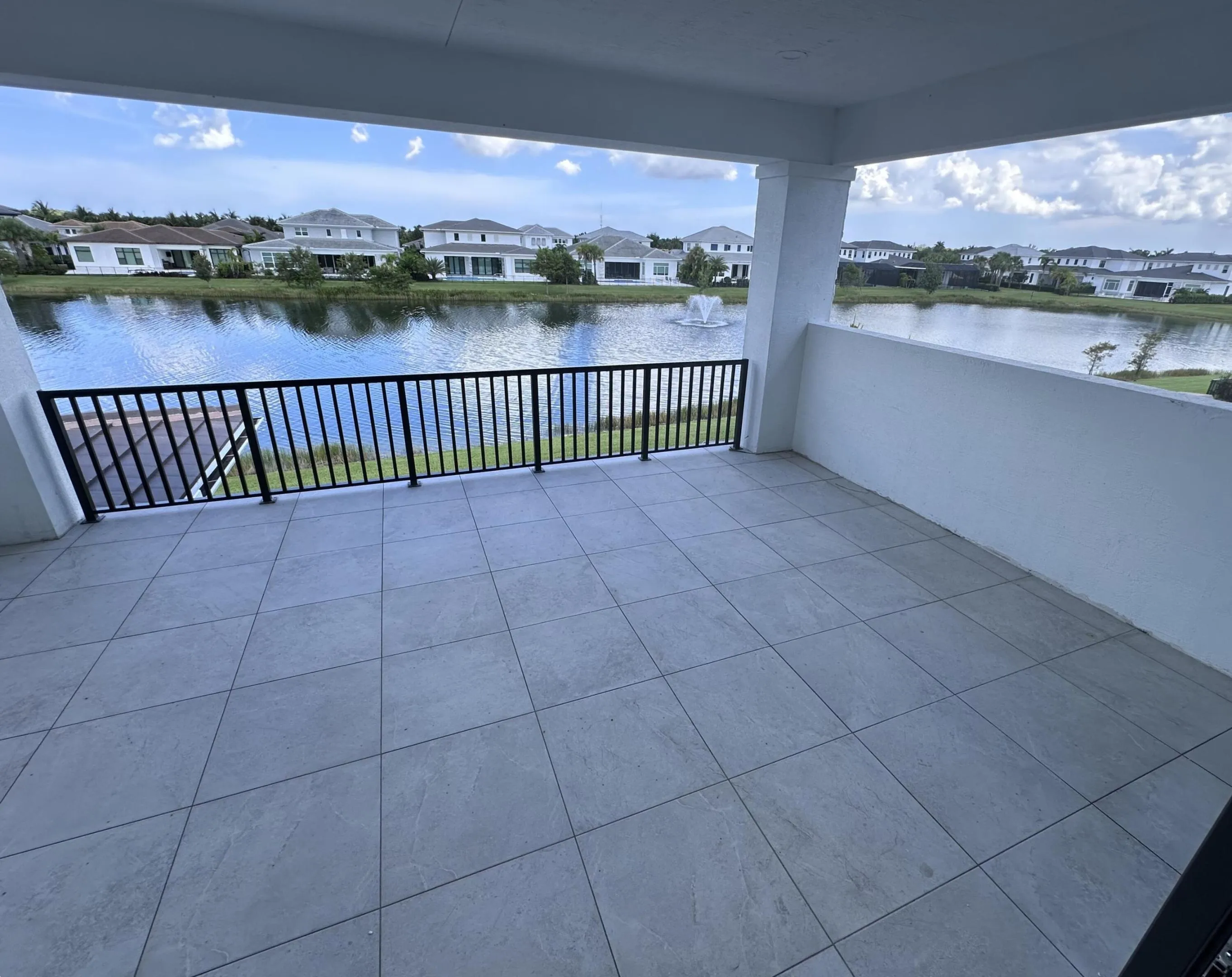 Sizeable Covered Balcony with Tranquil Water View overlookiing Fountain