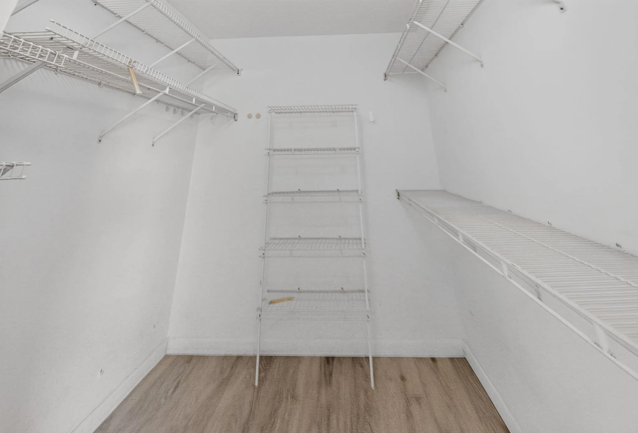 main bedroom walk in closet