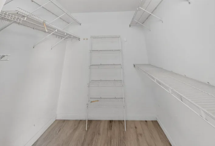 main bedroom walk in closet