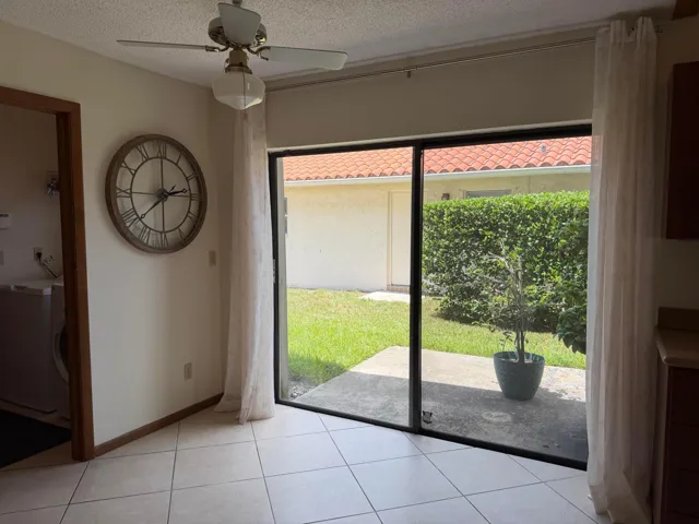 Sliding doors leading to Patio off of Eat-in Kitchen