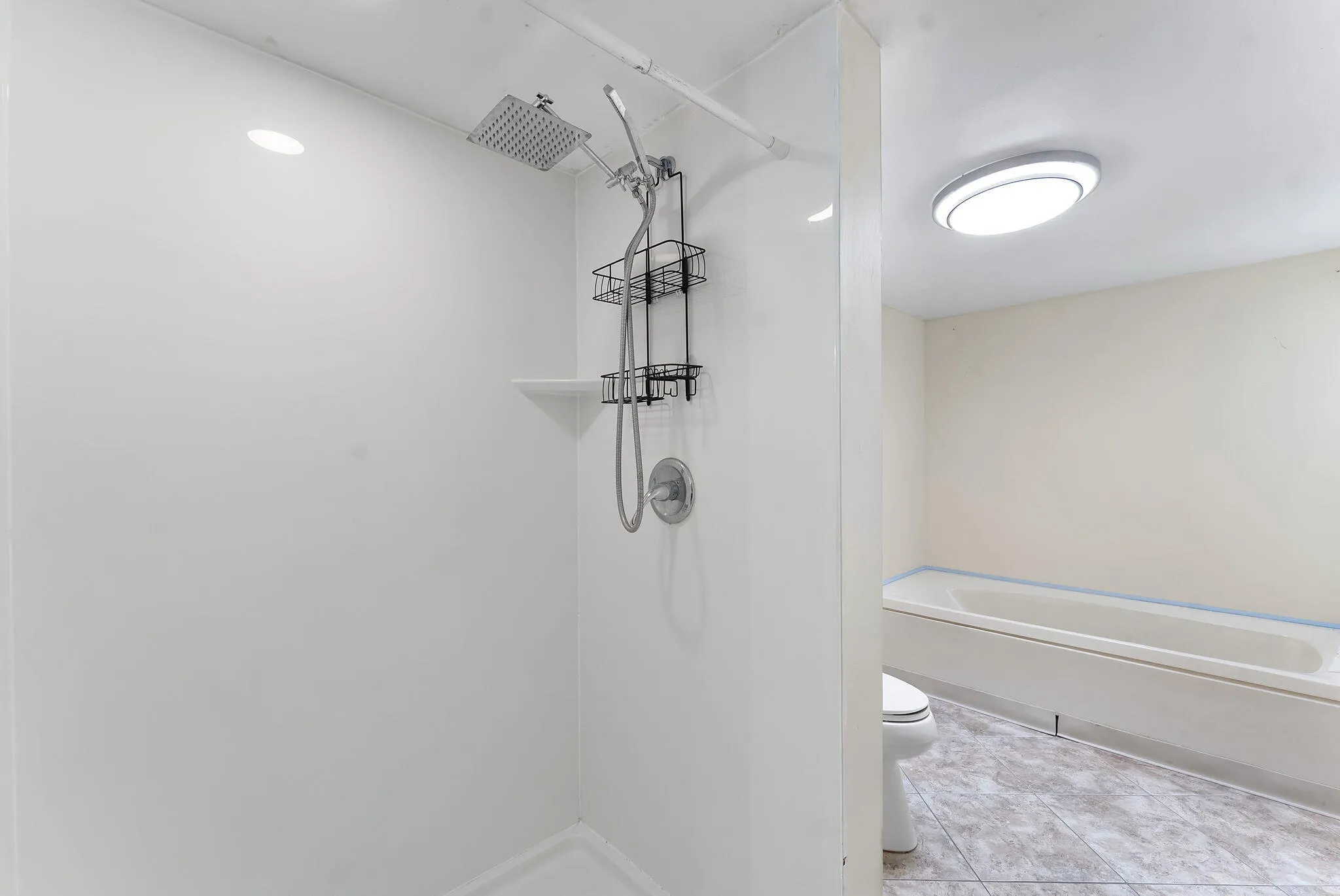 standing shower and tub