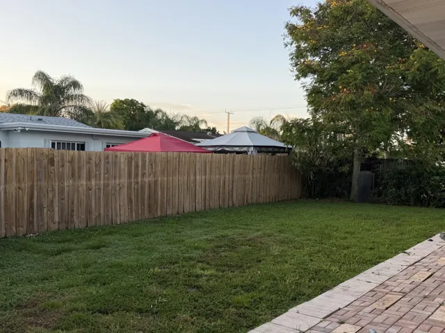 6 foot privacy fence in back yard