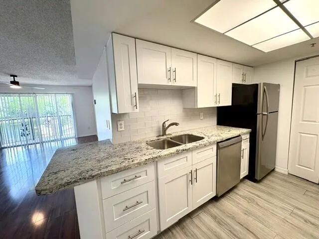 Kitchen With Tile Backsplash
