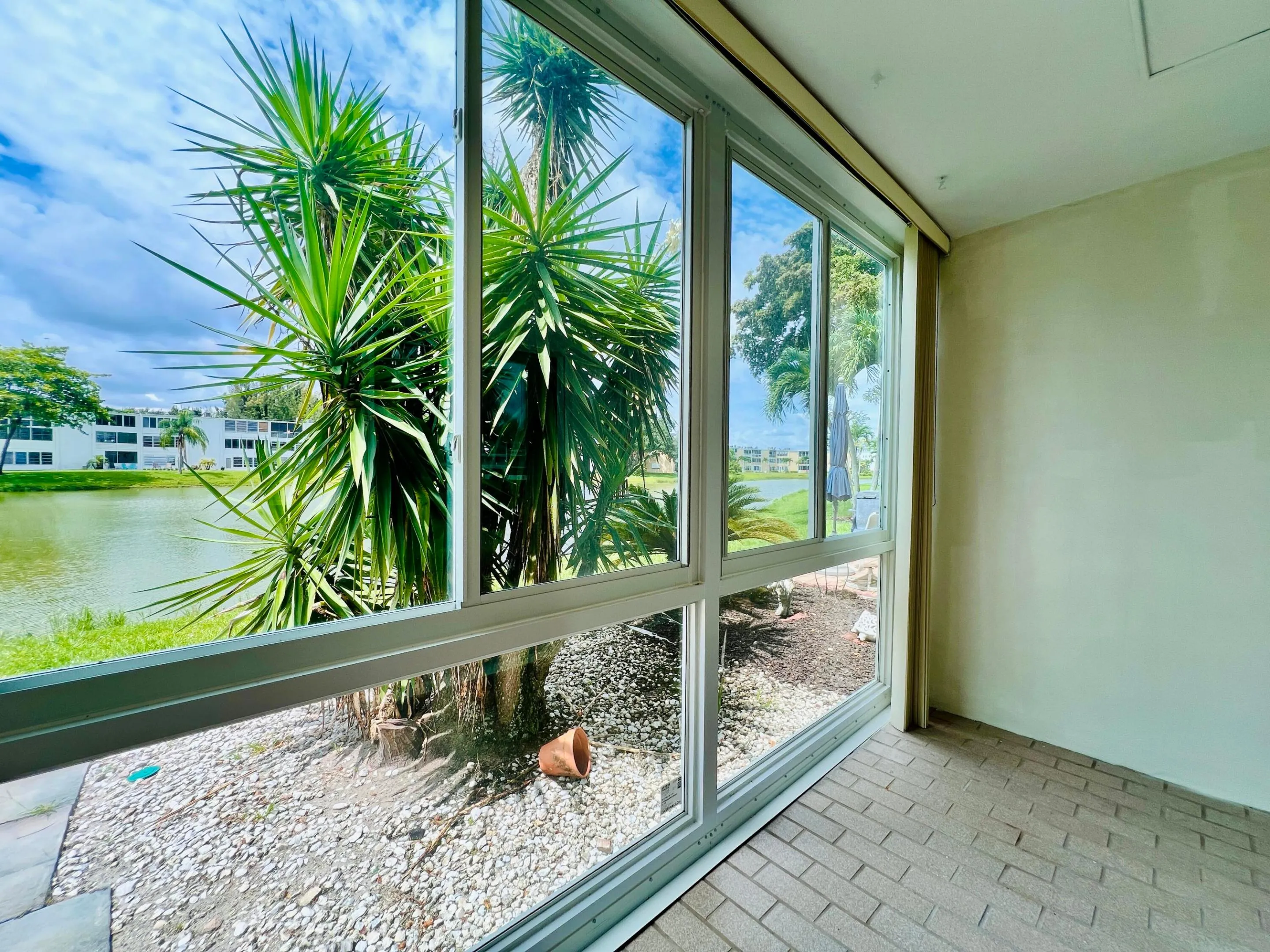 Gorgeous Enclosed Lanai With Floor to Ceiling Impact Windows