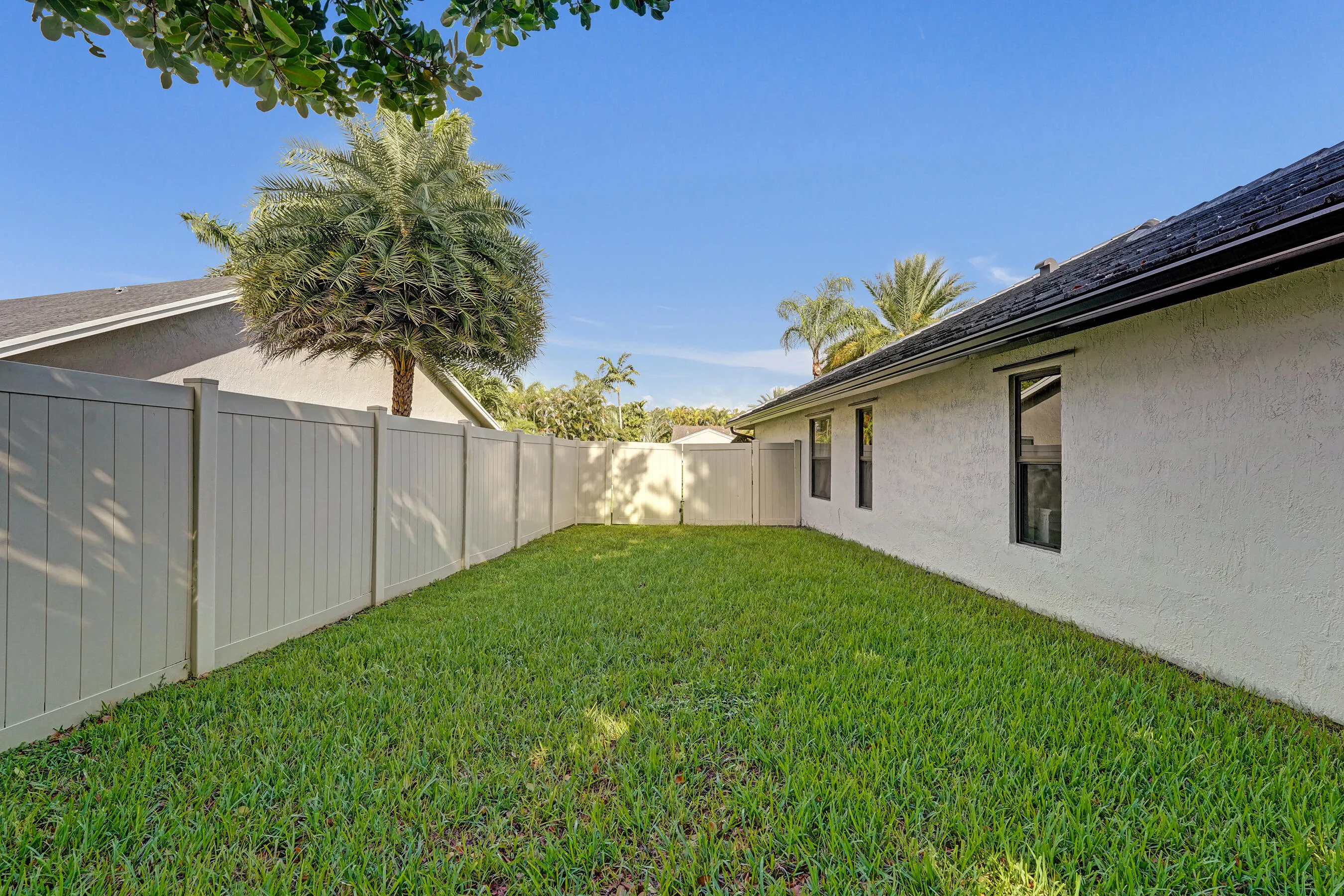Side yard with double gate access