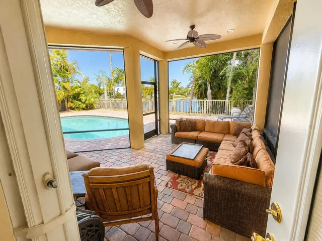 Covered Back Patio Area overlooking pool
