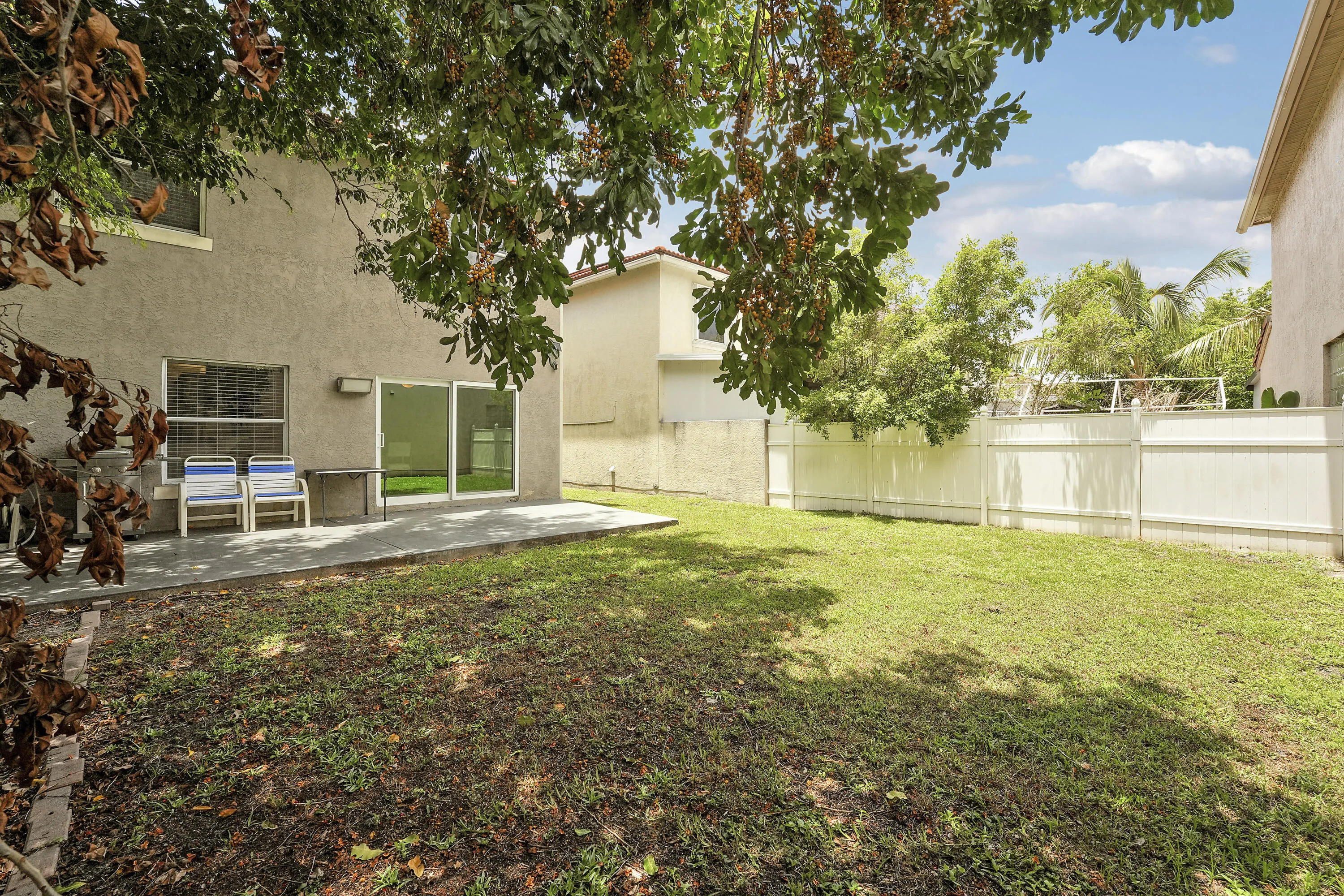 Private backyard with an oversized patio