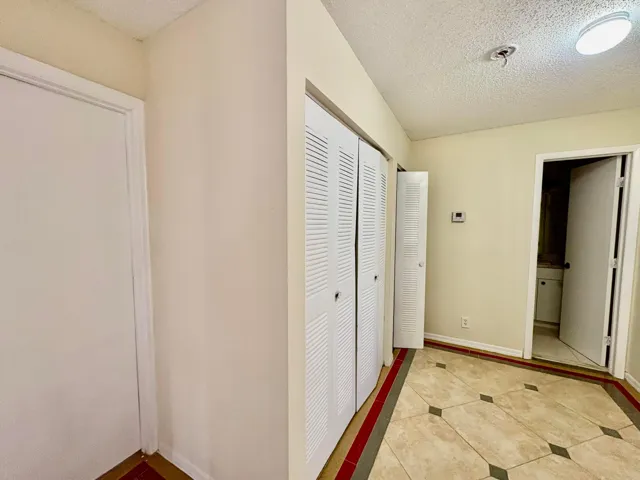 Upstairs Hall with Full Size Washer & Dryer