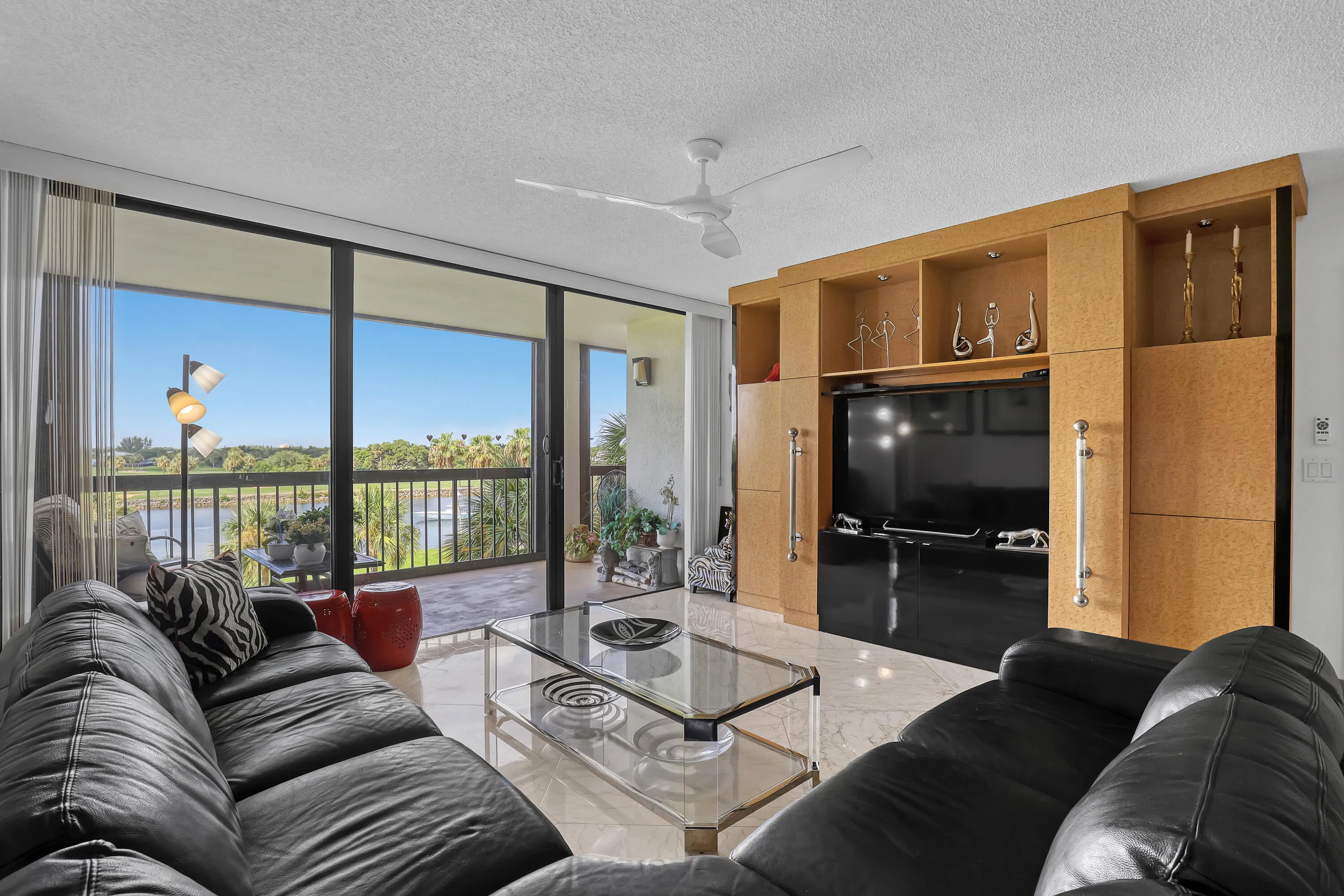 ICW & golf course frame the room