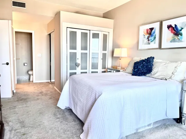 Features walk-in closet and a custom closet for extra storage
