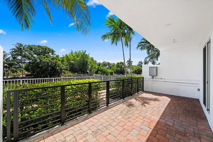 Patio on ground level, access to riverwalk.