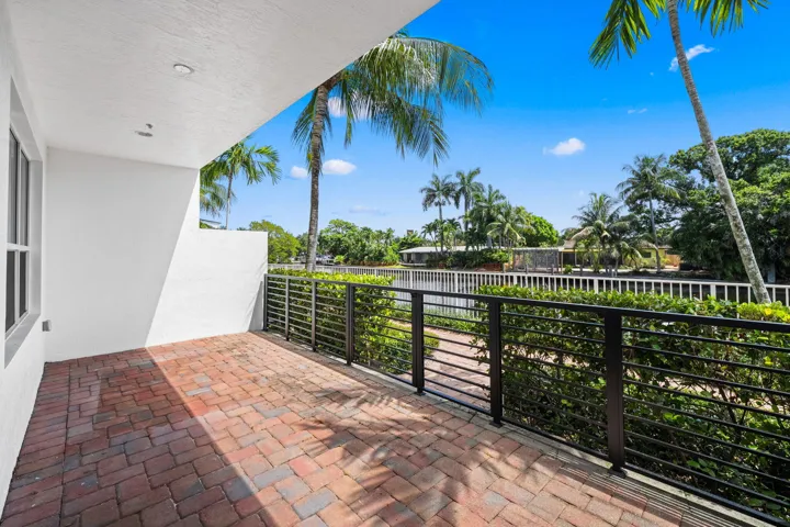 Patio on ground level, access to riverwalk.