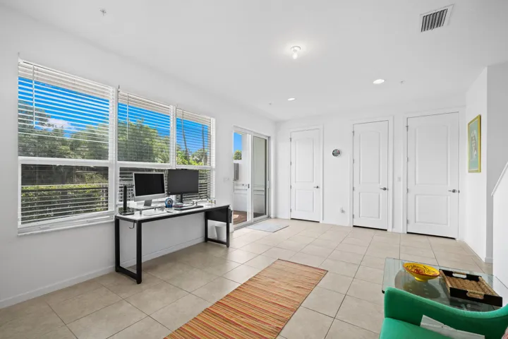 Half Bathroom (left door) and closet (center). A/C closet right side. Access to terrace > ideal for BBQ.