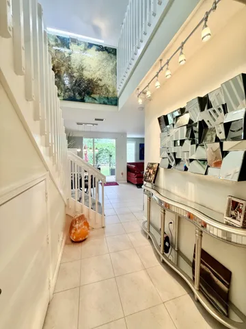 Downstairs Hallway, Half Bath, and Storage Area