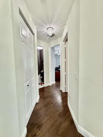 Upstairs Hallway with Linen Closet & Guest Bedrooms Access