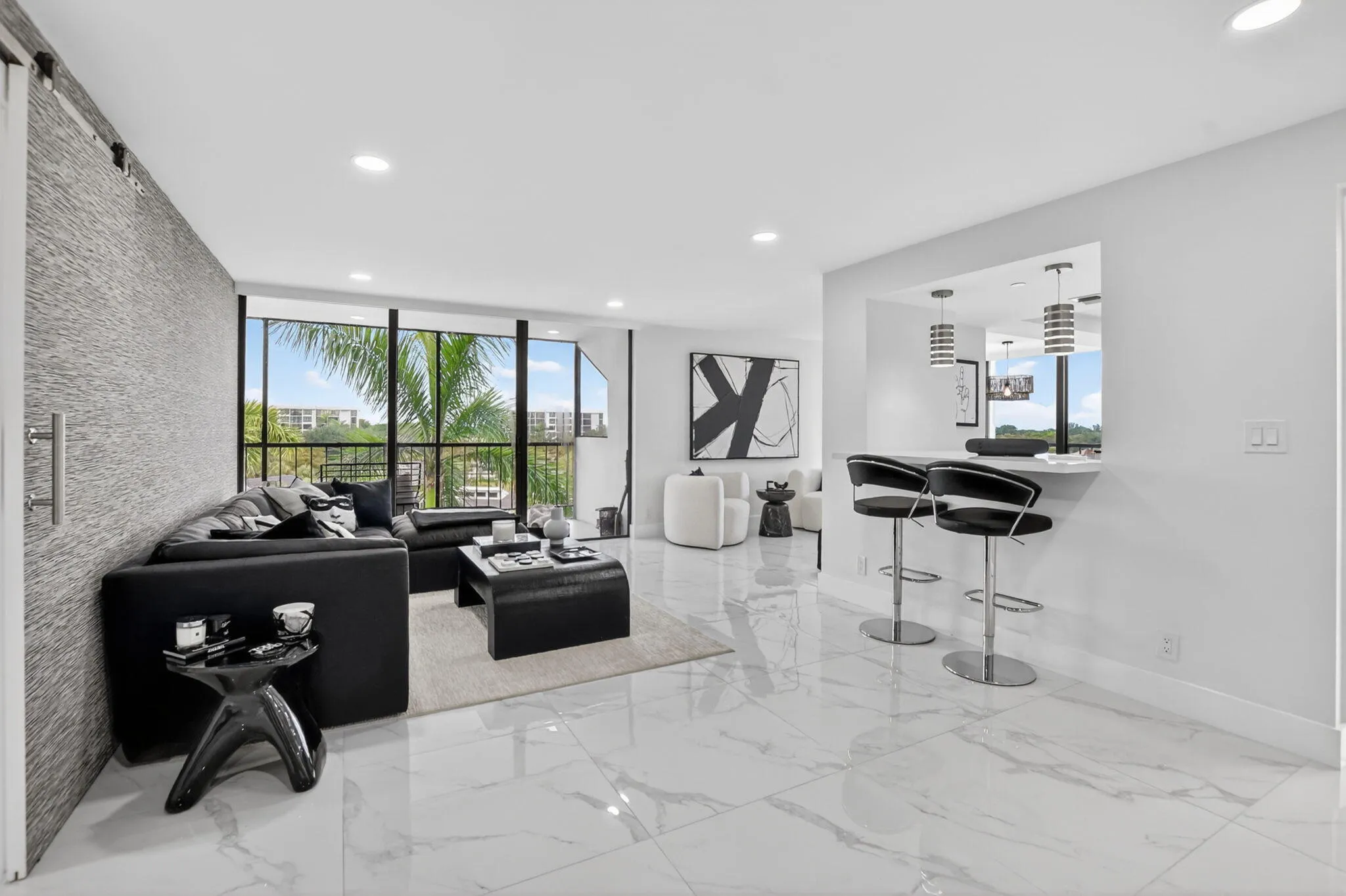 living room and bar seating, screened balcony