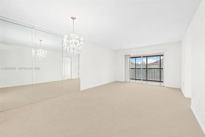 Living/ Dining. Freshly painted with new carpet.