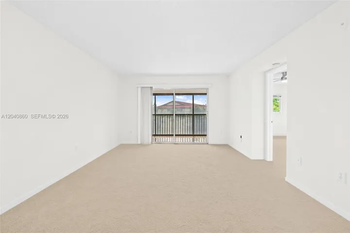 Living/ Dining. Freshly painted with new carpet.