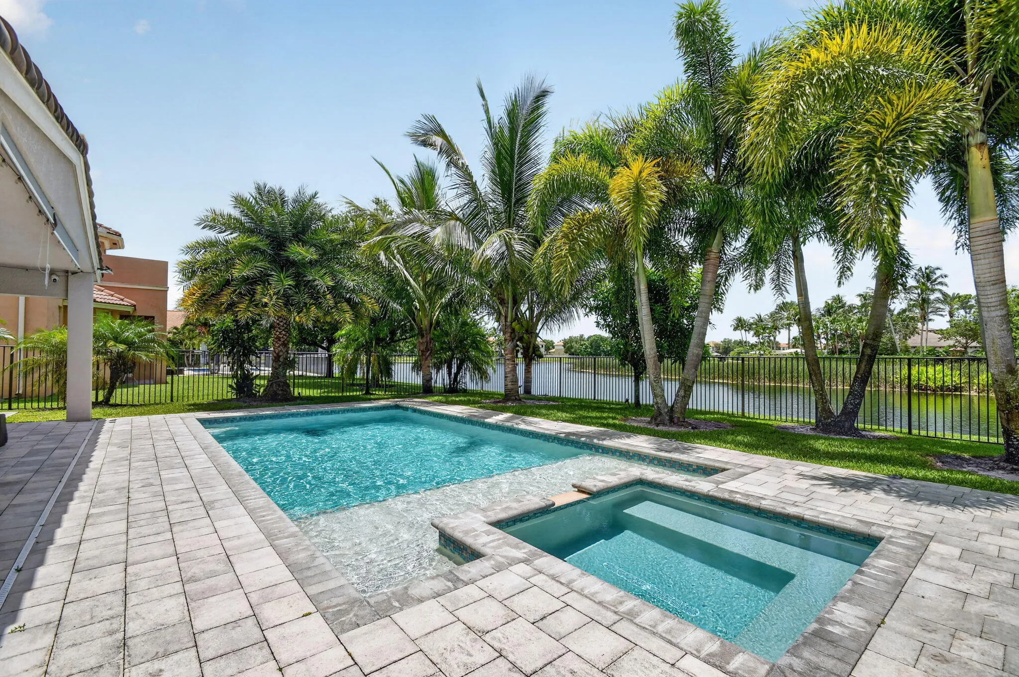 Backyard with pool and hot tub