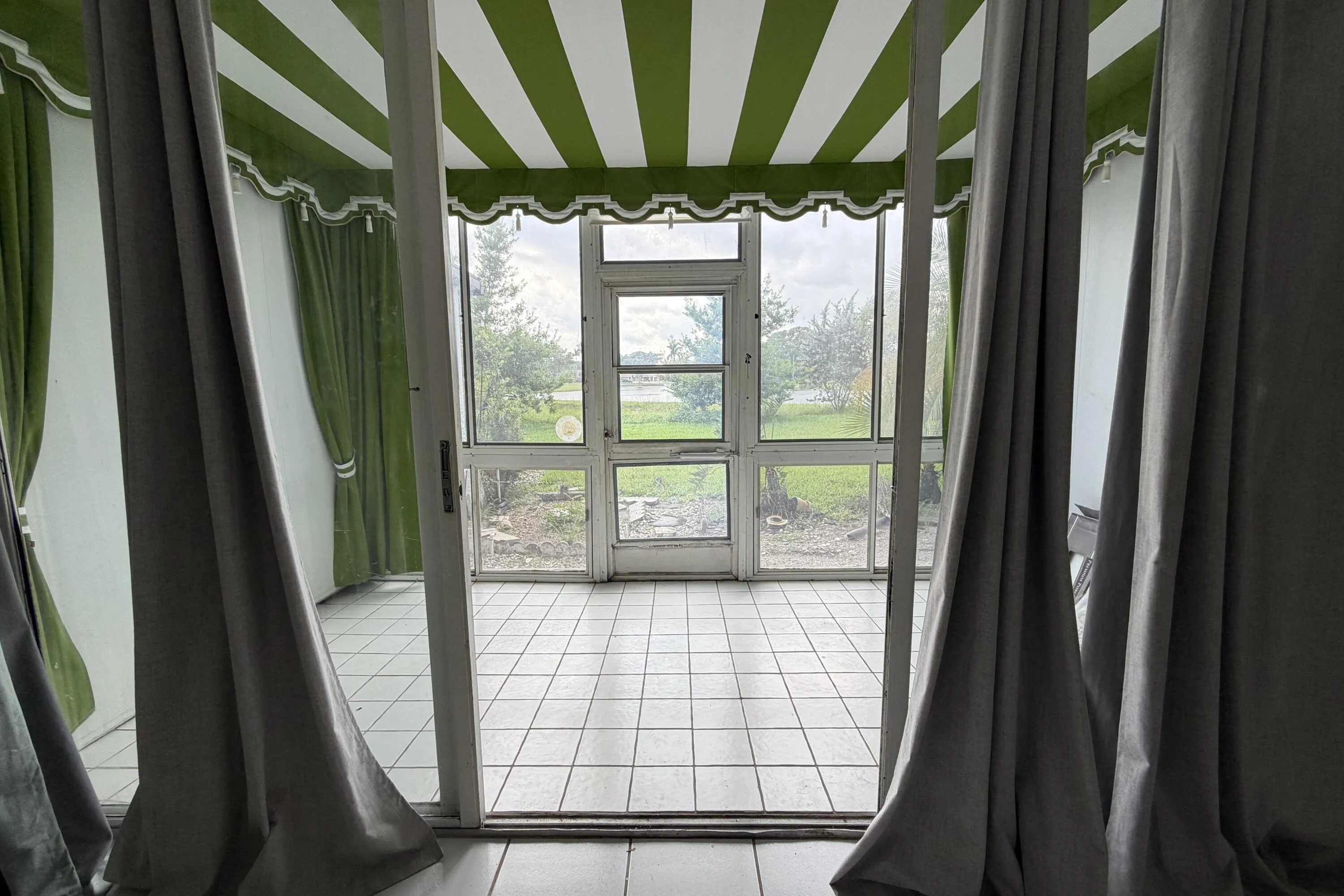 Screened patio with lake view.