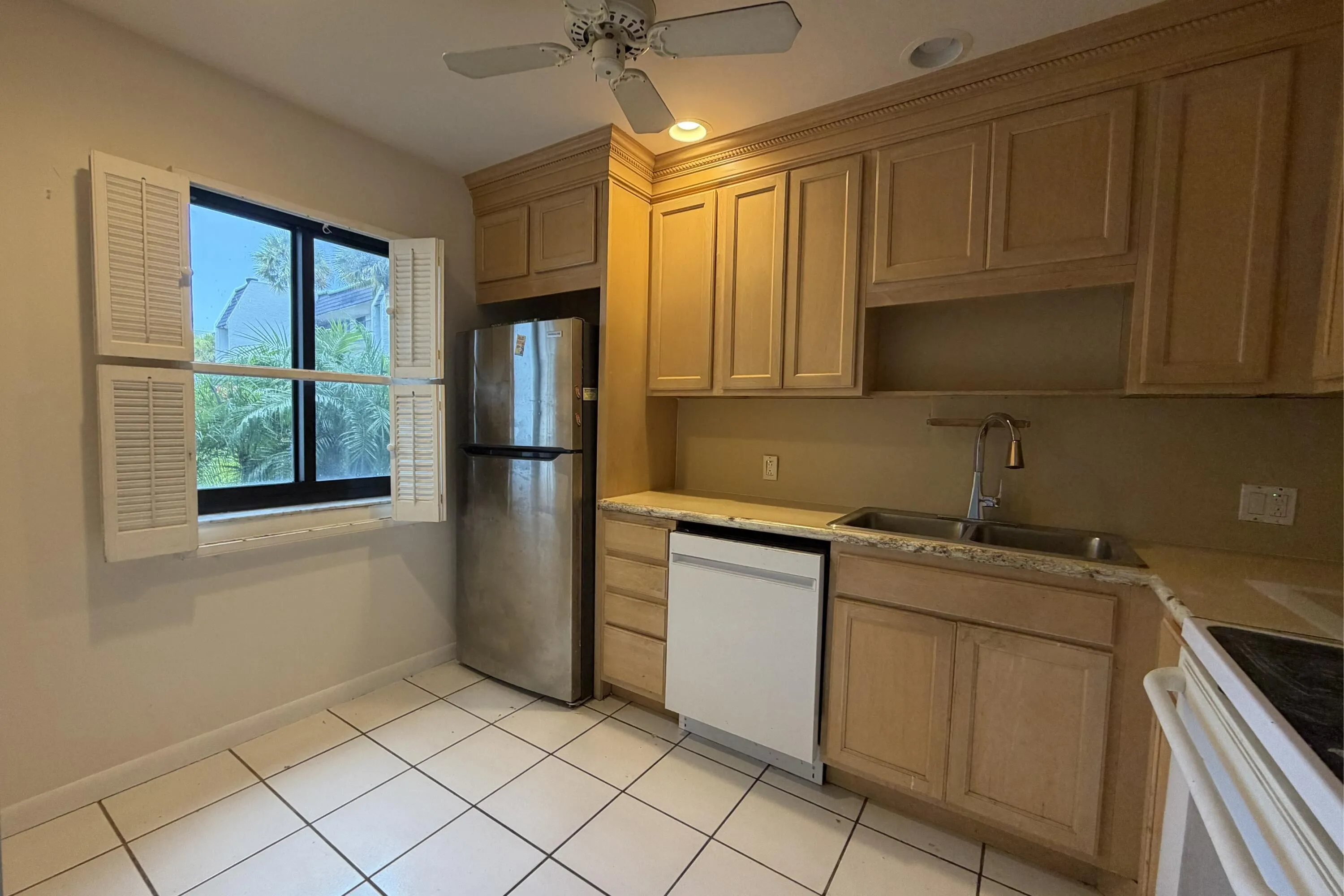 Wooden cabinets! (Stove, and oven to be upgraded.)