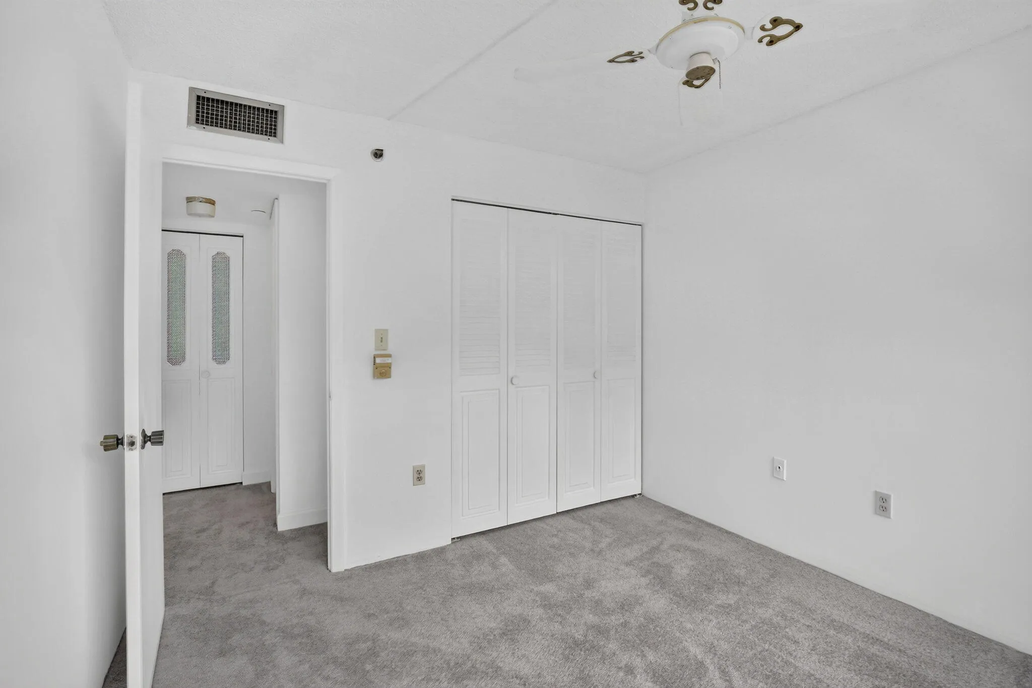 Guest bedroom closet fits all of your extra items!