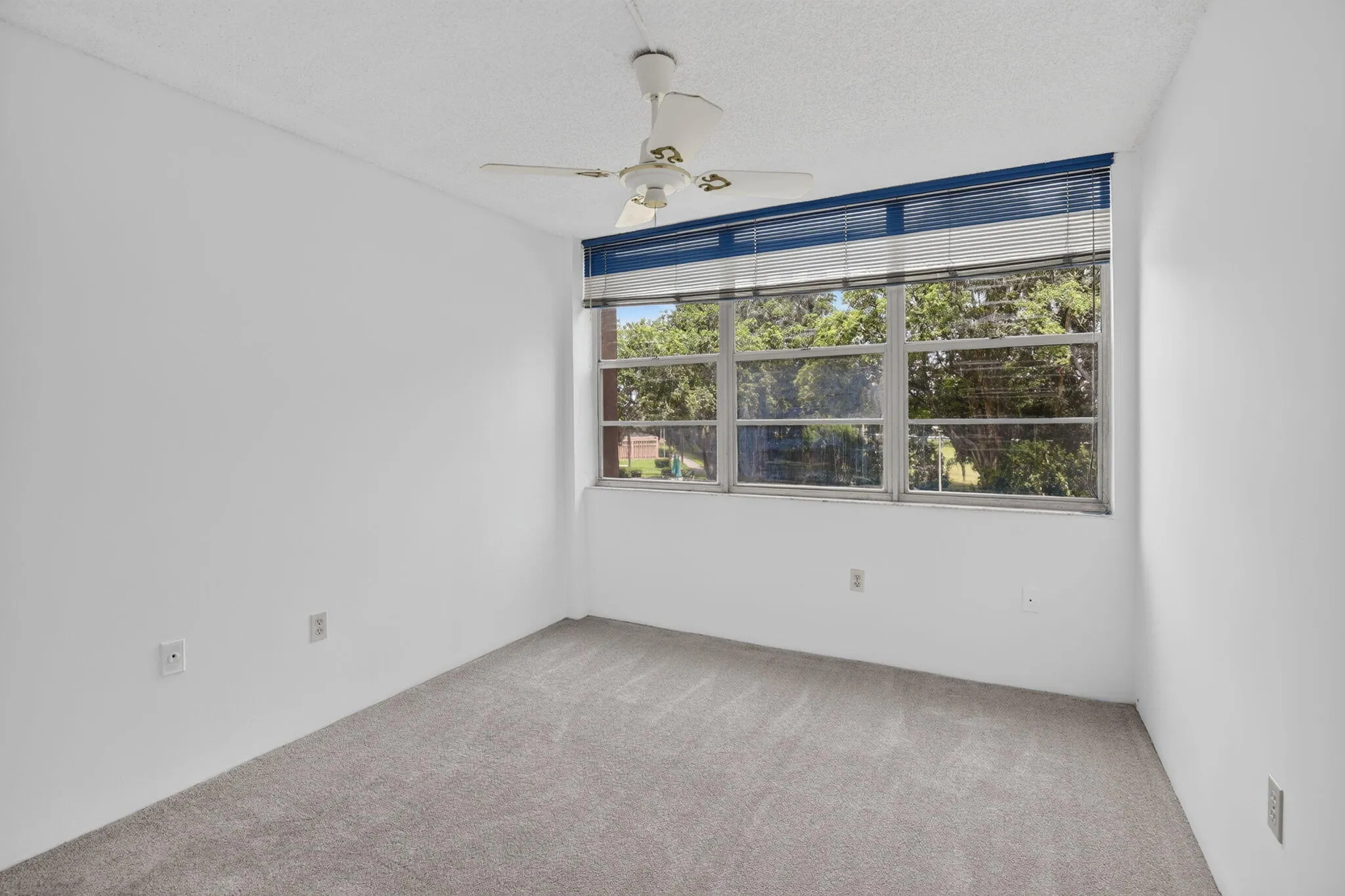 Guest bedroom with plenty of natural light and large closet!