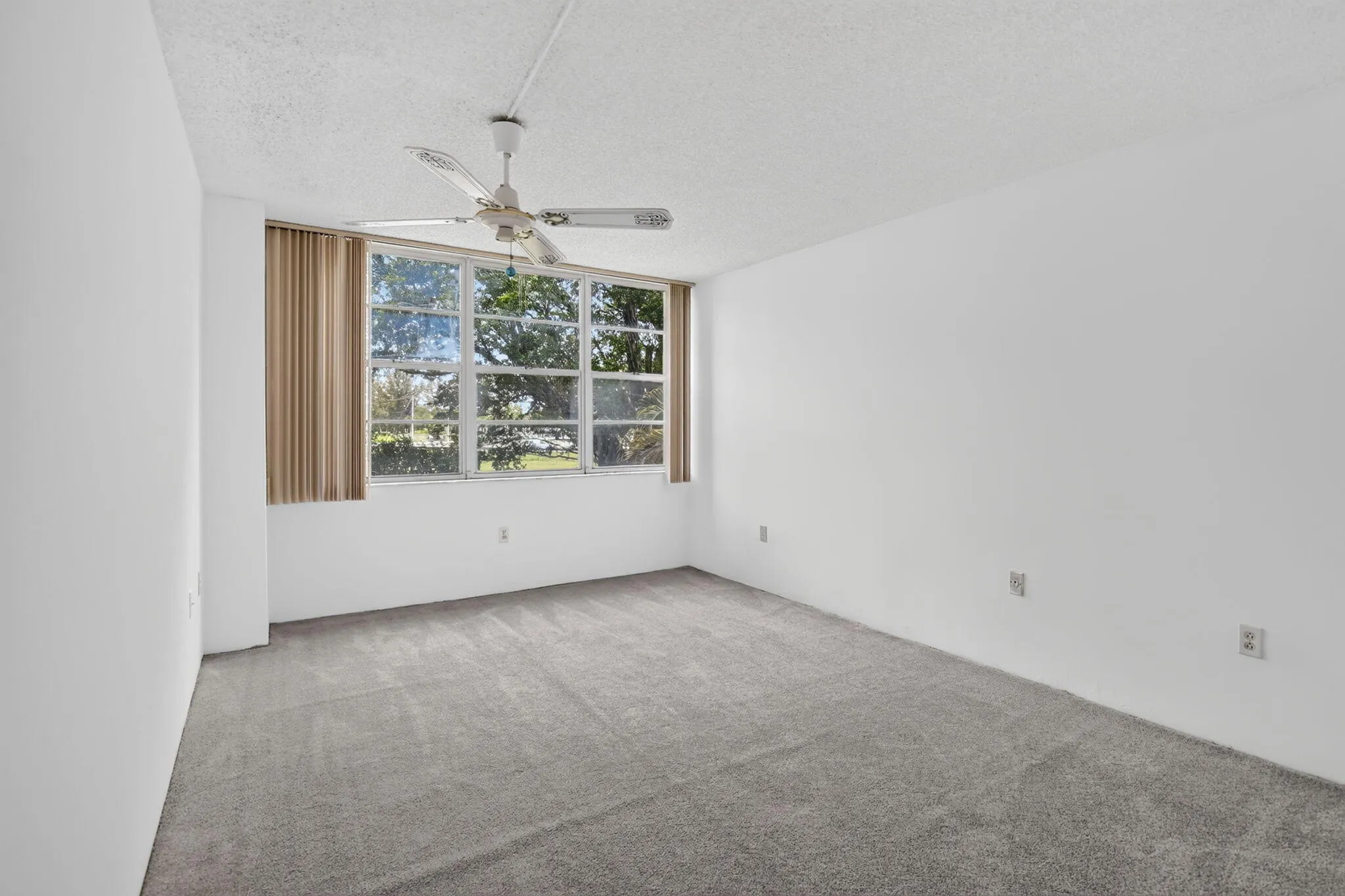 Primary bedroom suite with plenty of natural light!