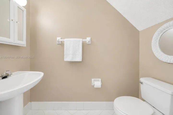 1/2 Bath, Downstairs.