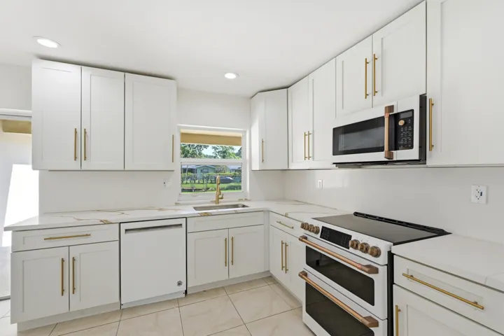 SEE POOL WHILE IN KITCHEN