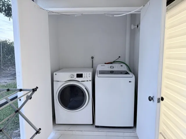 Laundry is located in the back screened patio