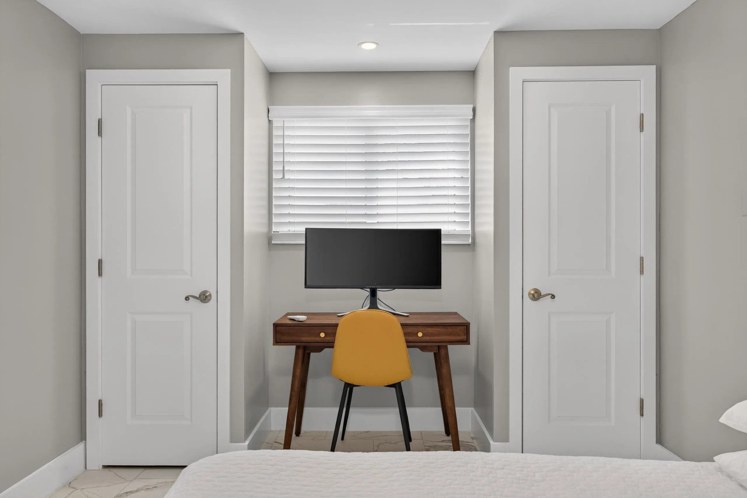 4th Bedroom/Studio that could be perfect for home office, studio rental, craft room, etc...with a small kitchenette, second set of washer/dryer, connected bathroom, mini split AC, and exterior door.