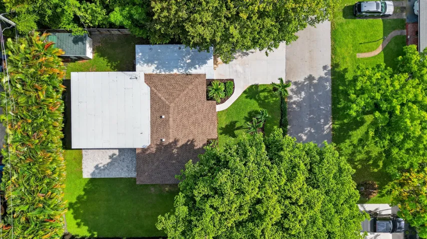 Arial view of the home showing large side/backyard area perfect for a pool.