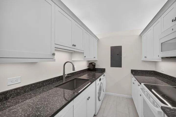 Includes Miele washer & dryer