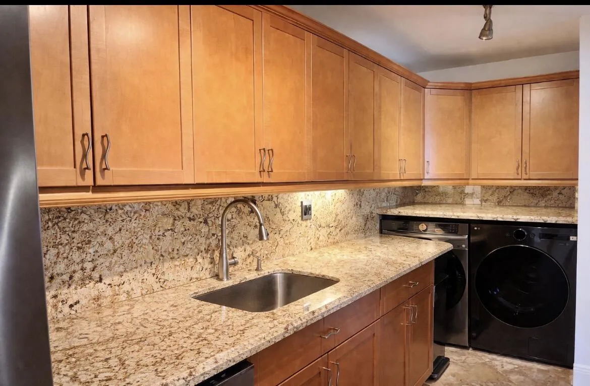 Kitchen with Wood Cabinetry & Granite countertops