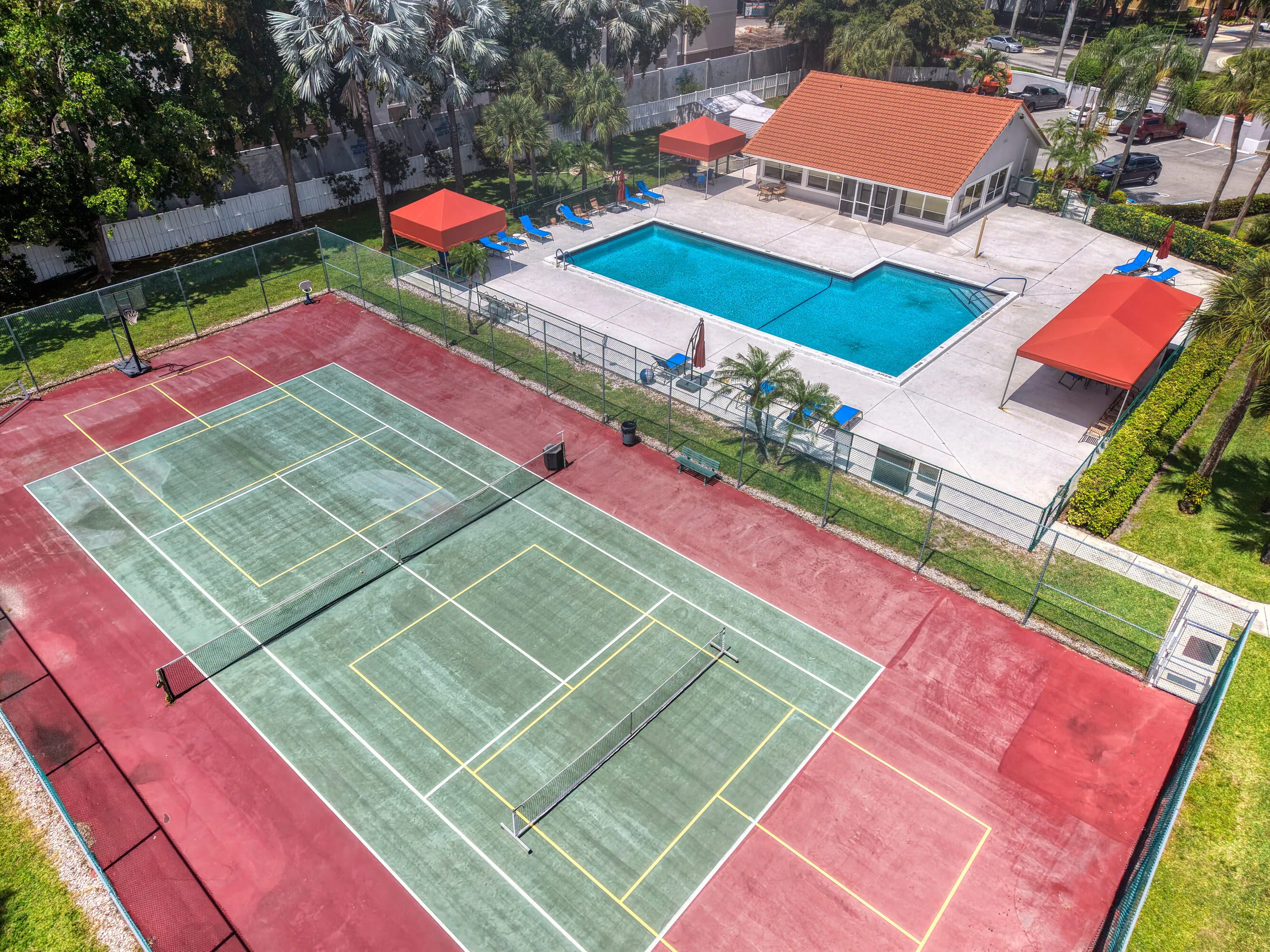Community Pool and Tennis Courts for Active Florida Living