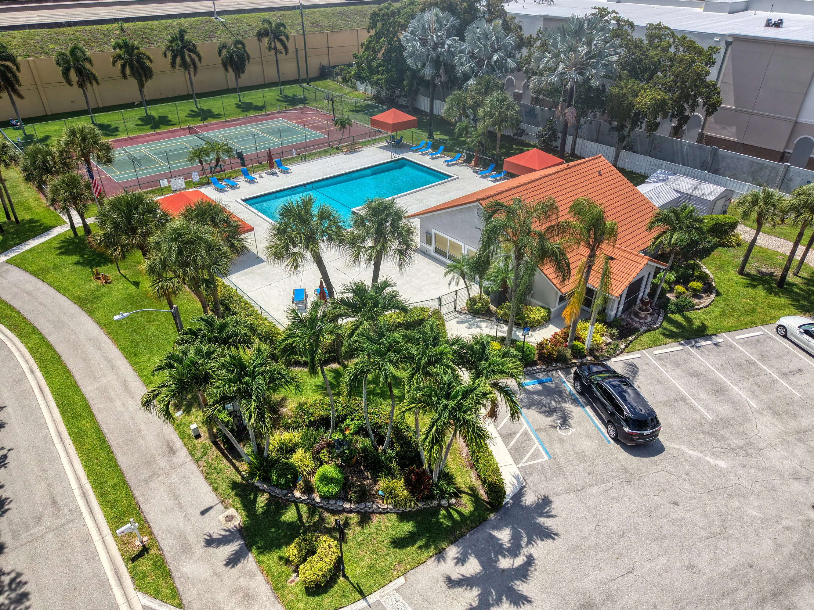Well Maintained Clubhouse with Tropical Landscaping